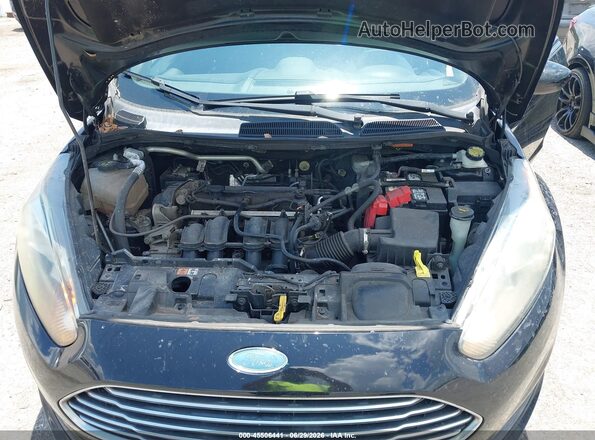 3FADP4BJXJM100377 2018 FORD FIESTA Black Rear view