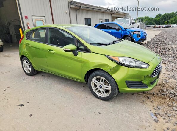 3FADP4EJ5JM142001 2018 FORD FIESTA Green Front right