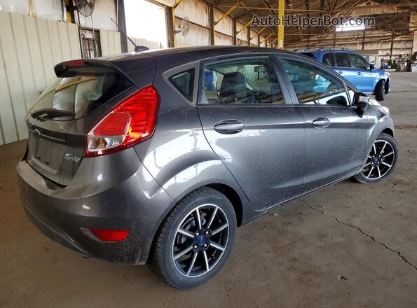 3FADP4EJ9GM156945 2016 FORD FIESTA Серый Задняя правая четверть