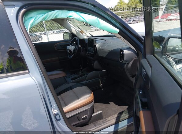 3FMCR9C64RRF36384 2024 FORD BRONCO SPORT Blue Vista interior delantera