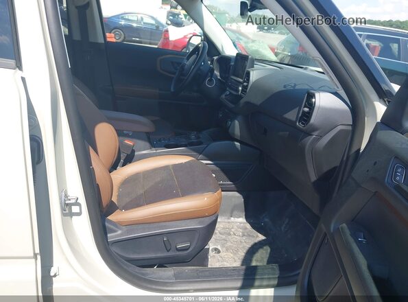 3FMCR9D94RRF73752 2024 FORD BRONCO SPORT Champagne Front interior view