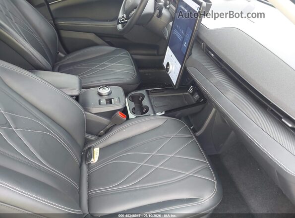 3FMTK1R44RMA21569 2024 FORD MUSTANG MACH-E Blue Front interior view