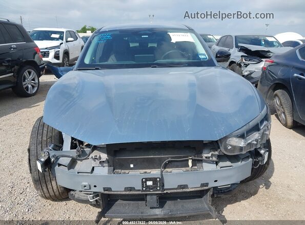 3FMTK3R4XRMA03136 2024 FORD MUSTANG MACH-E Blue Вид задньої частини салону