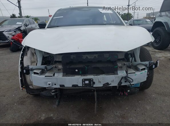 3FMTK4SX4RMA10951 2024 FORD MUSTANG MACH-E White Vista interior trasera