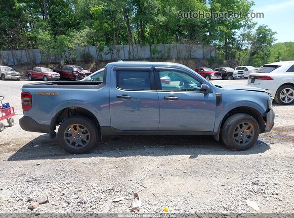 3FTTW8C92RRB36017 2024 FORD MAVERICK Синий Вид задней части салона