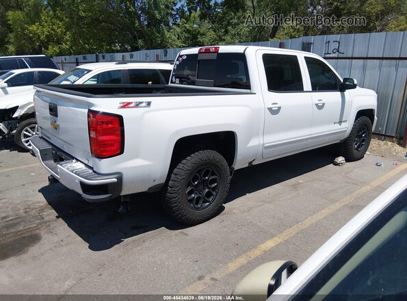 3GCUKREC6HG319588 2017 CHEVROLET SILVERADO White Tył prawy