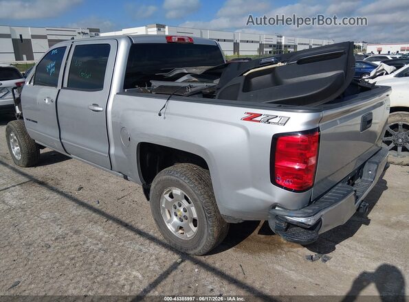 3GCUKREC8JG583062 2018 CHEVROLET SILVERADO Silver Trasero izquierdo
