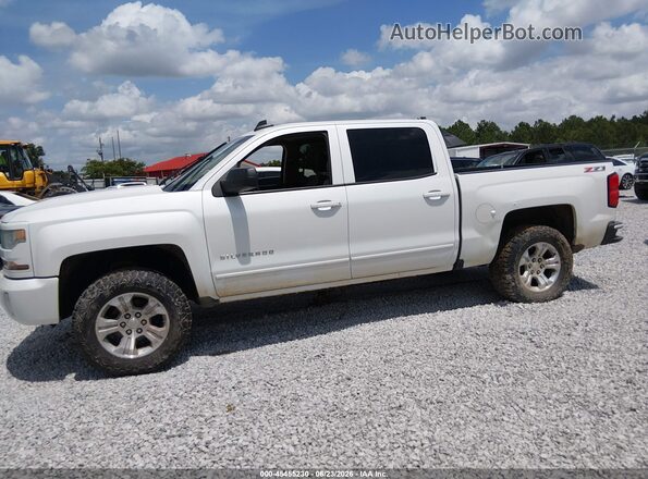 3GCUKREC9GG173542 2016 CHEVROLET SILVERADO White Rear interior view