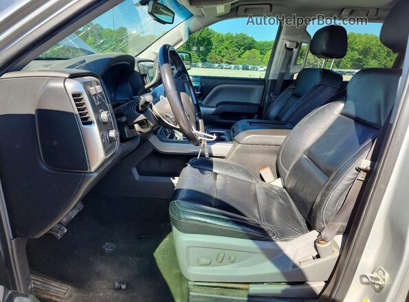 3GCUKREC9JG151015 2018 CHEVROLET SILVERADO Silver Вид салону спереду