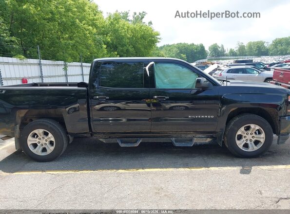 3GCUKREC9JG242589 2018 CHEVROLET SILVERADO Black Widok wnętrza z tyłu