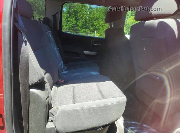3GCUKREC9JG548899 2018 CHEVROLET SILVERADO Red Vista de los asientos traseros