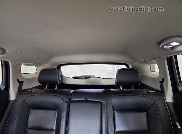 3GKALSEX2KL179228 2019 GMC TERRAIN White Vista de los asientos traseros