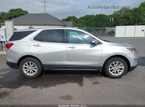 3GNAXJEV1JS501426 2018 CHEVROLET EQUINOX Silver Widok wnętrza z tyłu