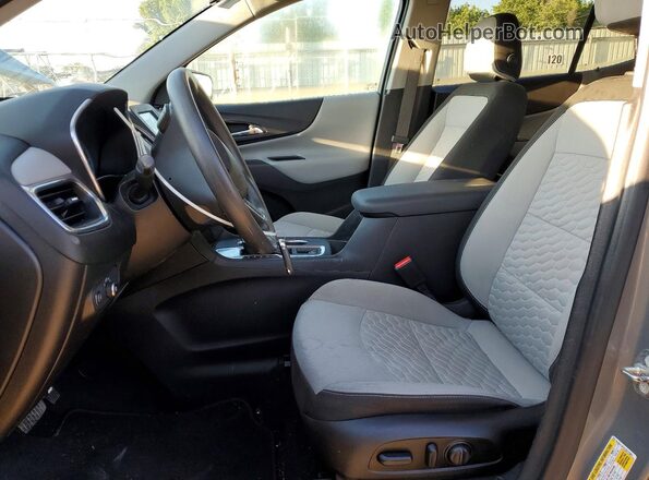 3GNAXJEV4JS574984 2018 CHEVROLET EQUINOX Gray Вид салону спереду