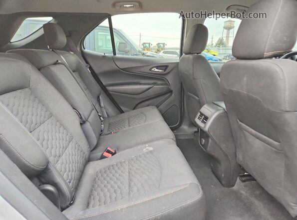 3GNAXJEV5JS570359 2018 CHEVROLET EQUINOX Silver Vista interior trasera
