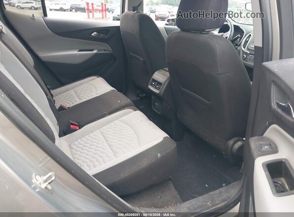 3GNAXJEV5JS637977 2018 CHEVROLET EQUINOX Gray VIN կոդի պիտակի տեսք