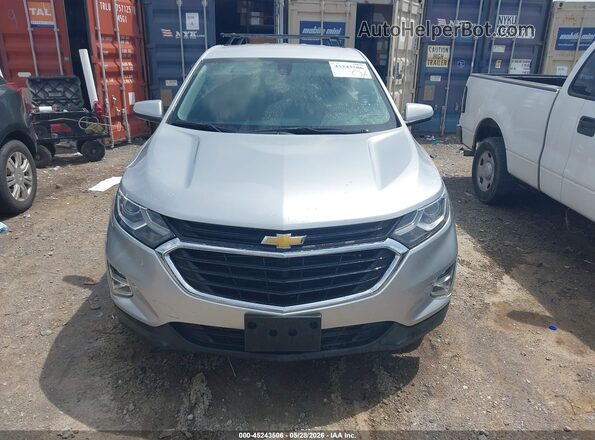 3GNAXJEV8JS599693 2018 CHEVROLET EQUINOX Серебряный 