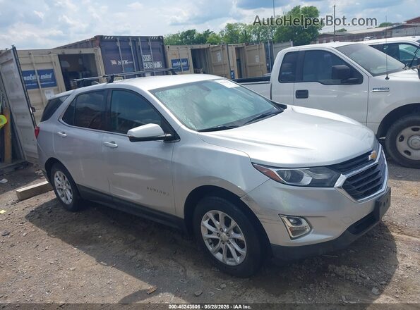 3GNAXJEV8JS599693 2018 CHEVROLET EQUINOX Серебряный 