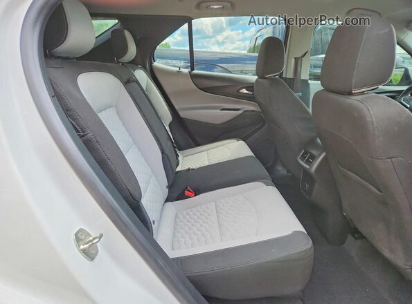 3GNAXJEV9JS519964 2018 CHEVROLET EQUINOX White Вид задньої частини салону