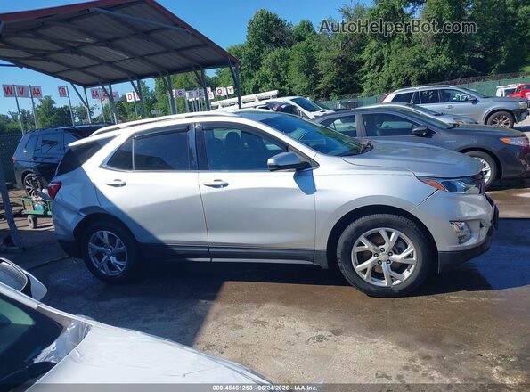 3GNAXKEX5JS603190 2018 CHEVROLET EQUINOX Серебряный Вид задней части салона