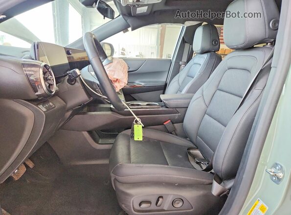 3GNAXPEG1SL202809 2025 CHEVROLET EQUINOX Green Widok wnętrza z przodu