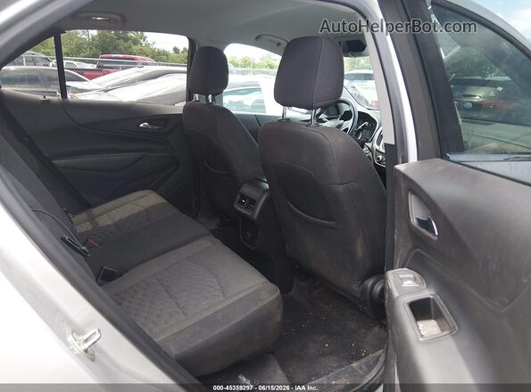 3GNAXSEV5JS606573 2018 CHEVROLET EQUINOX Silver VIN კოდის სტიკერის ხედი