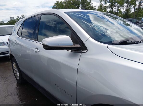 3GNAXSEV5JS606573 2018 CHEVROLET EQUINOX Silver უკანა სალონის ხედი