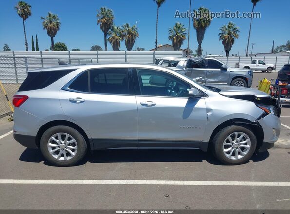 3GNAXSEV7JS588769 2018 CHEVROLET EQUINOX Silver Widok wnętrza z tyłu