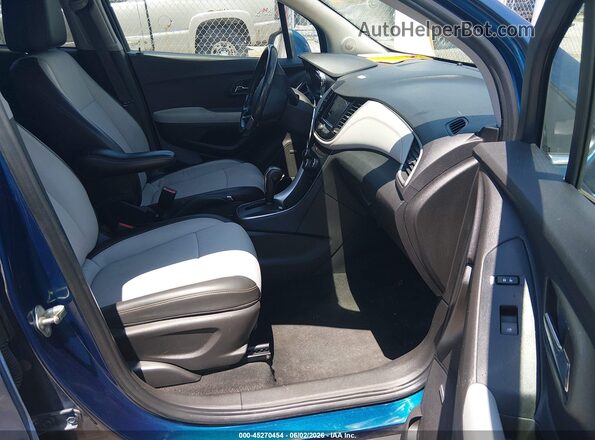 3GNCJPSB7LL280662 2020 CHEVROLET TRAX Blue Вид салону спереду
