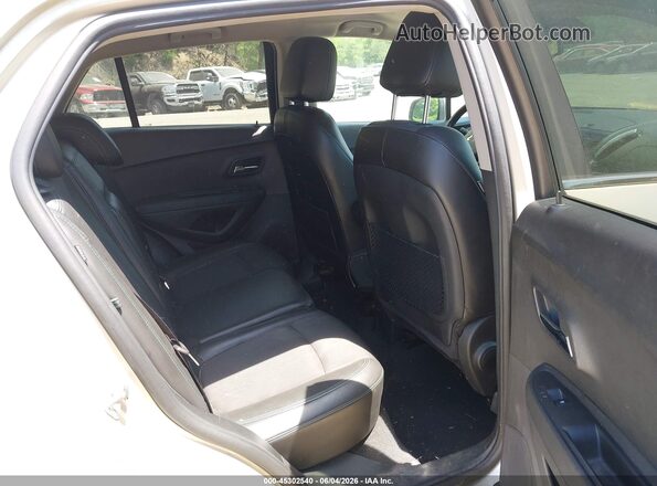 3GNCJPSB8GL226034 2016 CHEVROLET TRAX Beige Vista de la etiqueta del VIN