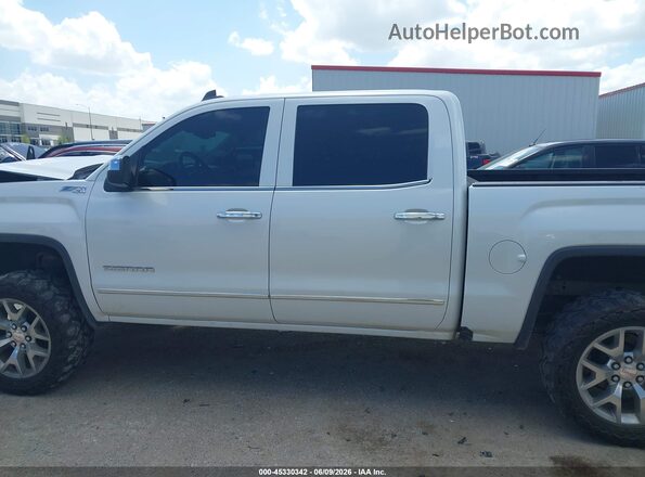 3GTU2NEC7JG623916 2018 GMC SIERRA Белый Вид панели приборов
