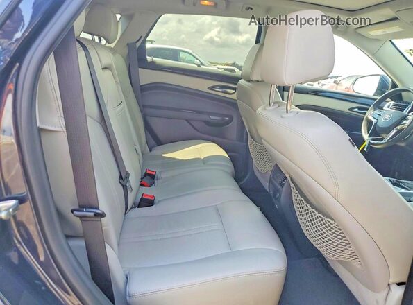3GYFNBE38GS586258 2016 CADILLAC SRX Blue Widok wnętrza z tyłu