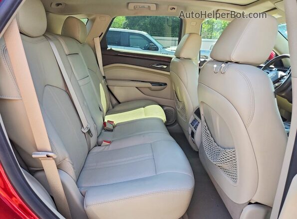 3GYFNCE32GS510489 2016 CADILLAC SRX Красный Вид задней части салона