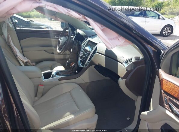 3GYFNCE3XGS556667 2016 CADILLAC SRX Burgundy Front interior view