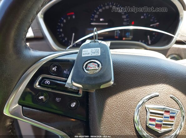 3GYFNCE3XGS572058 2016 CADILLAC SRX Brown Vista del salpicadero