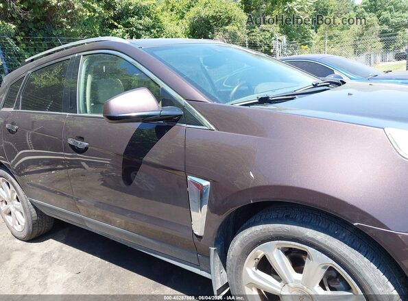 3GYFNCE3XGS572058 2016 CADILLAC SRX Brown Vista interior trasera
