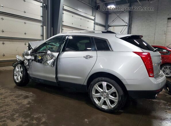 3GYFNCE3XGS581634 2016 CADILLAC SRX Silver Trasero izquierdo