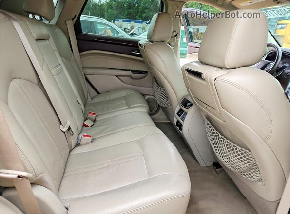 3GYFNDE37GS528220 2016 CADILLAC SRX Tan უკანა სალონის ხედი