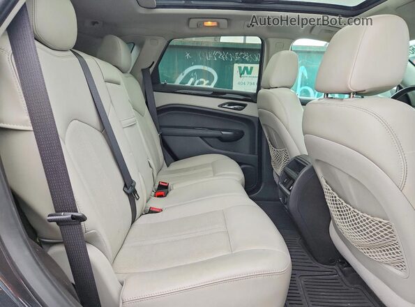 3GYFNEE31GS569383 2016 CADILLAC SRX Charcoal Vista interior trasera