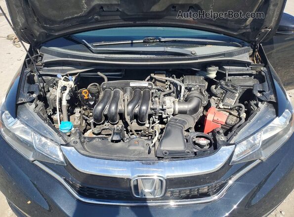 3HGGK5H44JM735352 2018 HONDA FIT Черный Вид задней части салона