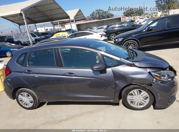 3HGGK5H47KM720023 2019 HONDA FIT Gray Vista interior trasera