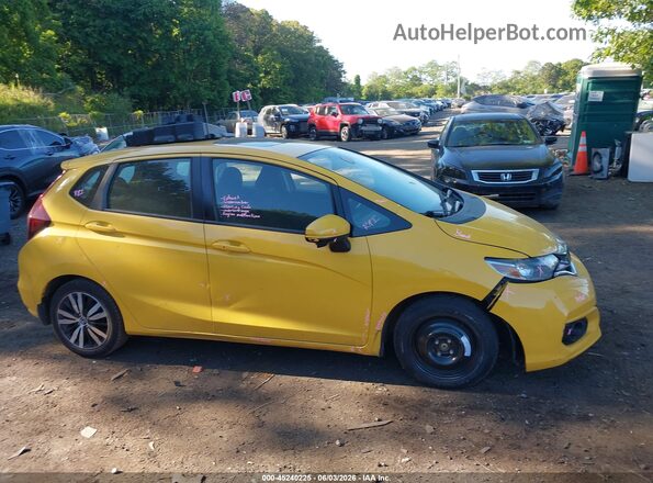3HGGK5H84JM724709 2018 HONDA FIT Yellow Rear interior view
