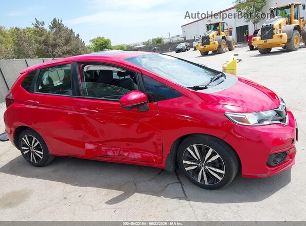 3HGGK5H8XJM717375 2018 HONDA FIT Red Սալոնի հետևի տեսք