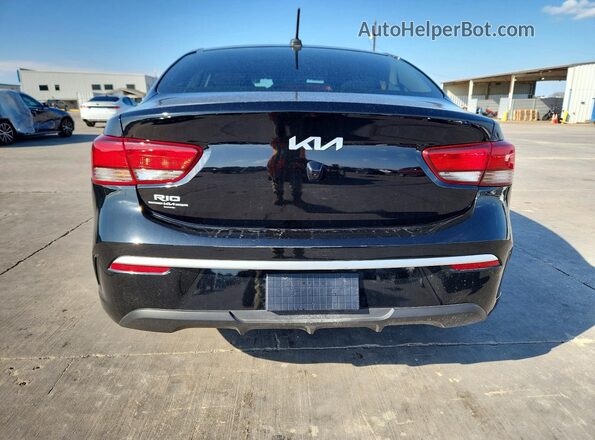 3KPA24AD0PE559041 2023 KIA RIO Black უკანა ხედი