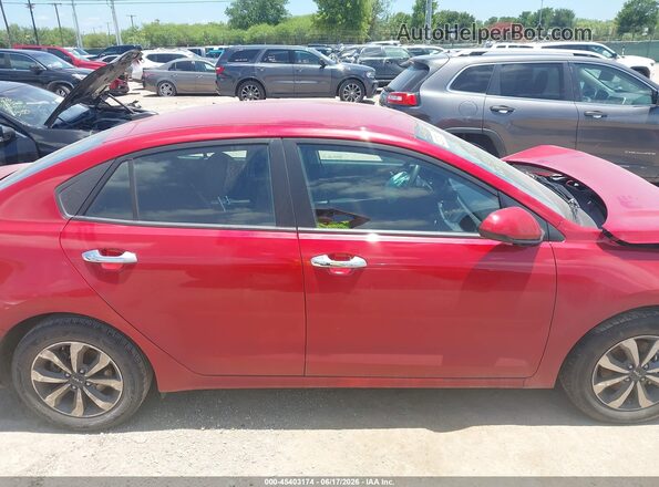 3KPA24AD0PE612403 2023 KIA RIO Red Widok wnętrza z tyłu