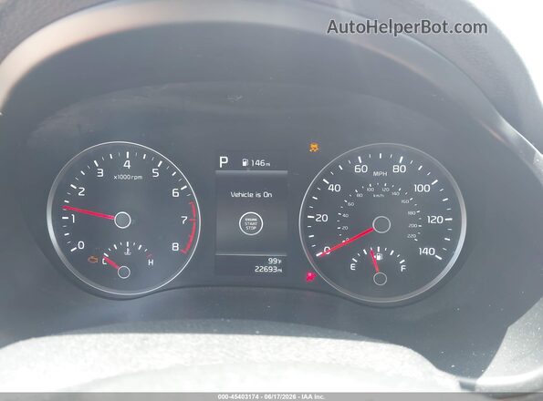 3KPA24AD0PE612403 2023 KIA RIO Red Widok tylnych siedzeń
