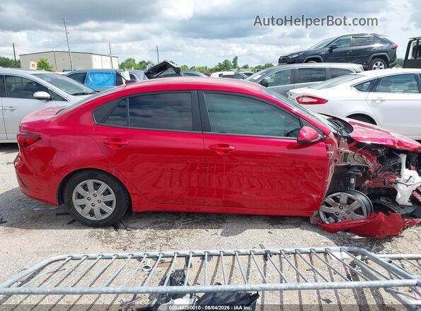 3KPA24AD1PE578522 2023 KIA RIO Красный Вид задней части салона