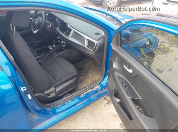 3KPA24AD1PE582022 2023 KIA RIO Blue Widok wnętrza z przodu