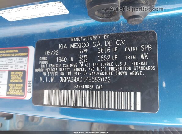 3KPA24AD1PE582022 2023 KIA RIO Blue Widok komory silnika