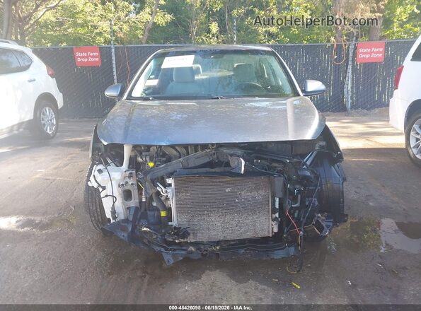 3KPA24AD2LE349924 2020 KIA RIO Серый Вид задней части салона